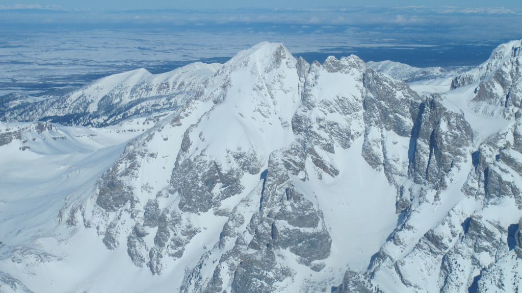 The South Teton. The line descends the large hanging snowfield skiers right of the picturesque couloir. 